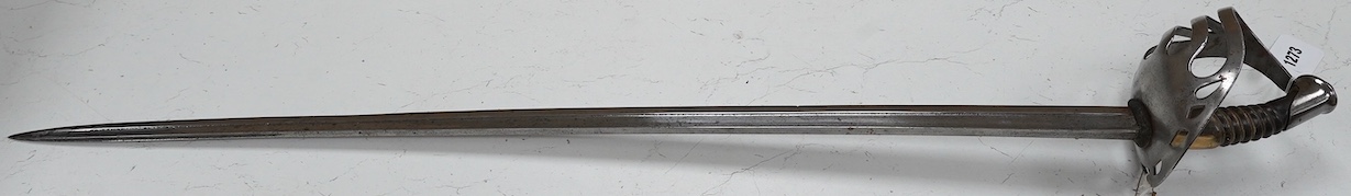 An 1880s French cavalry sword with horn grip and seven bar pierced steel guard, blade 88cm. Condition - fair